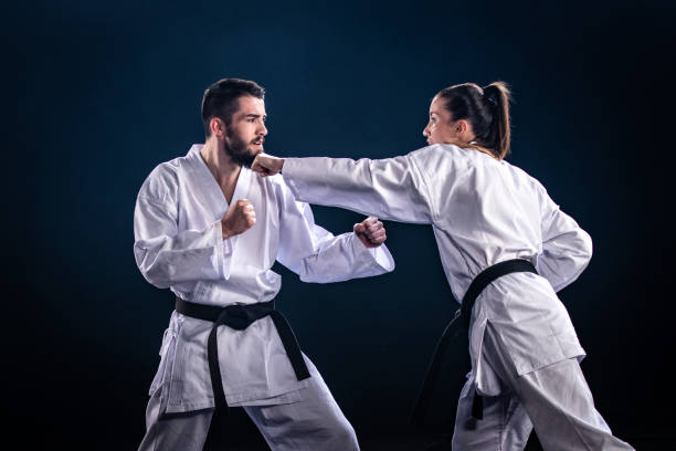 istock Karate players competing during the match 1182419815