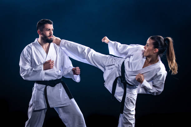 istock Karate players competing during the match 1182419823