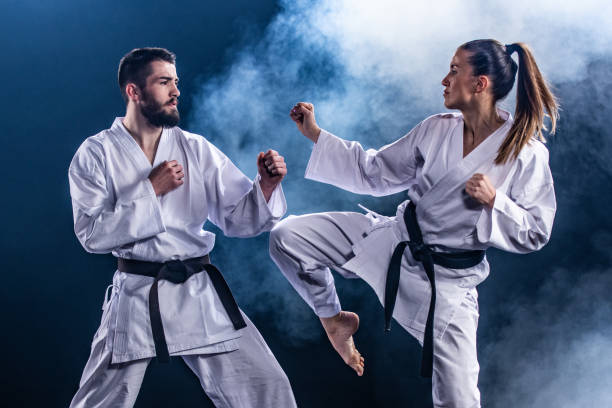 istock Karate players competing during the match 1182419839