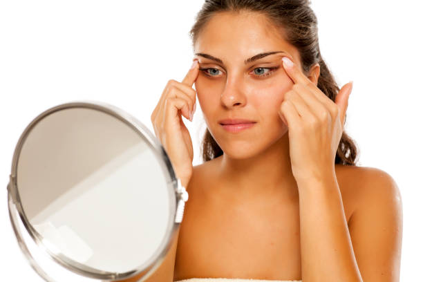 istock young girl tightens her eyes with her hands 1182422826
