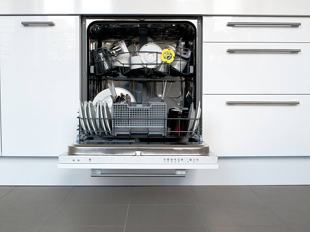 open dishwasher and kitchen drawers cabinets - diskmaskin bildbanksfoton och bilder