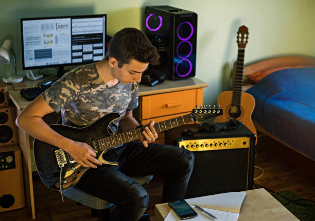 istock Teenager musician 1182425637