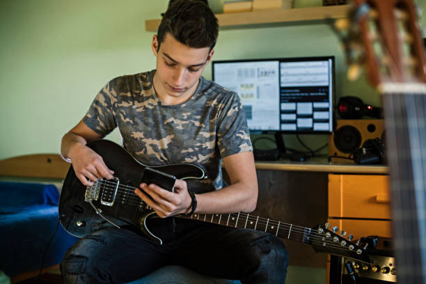 istock Teenager musician 1182426183