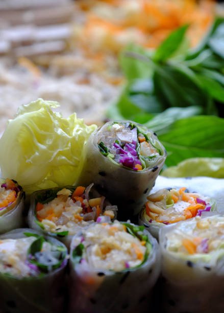 istock sliced vegan rice paper rolls and Vietnamese spring roll ingredient 1182426436