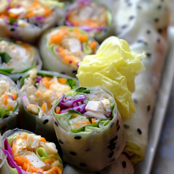 istock sliced vegan rice paper rolls and Vietnamese spring roll ingredient 1182426453