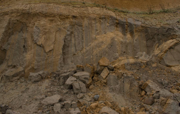 istock Nature background. landslide on steep coastal cliffs . Sand and clay rocks. 1182426762