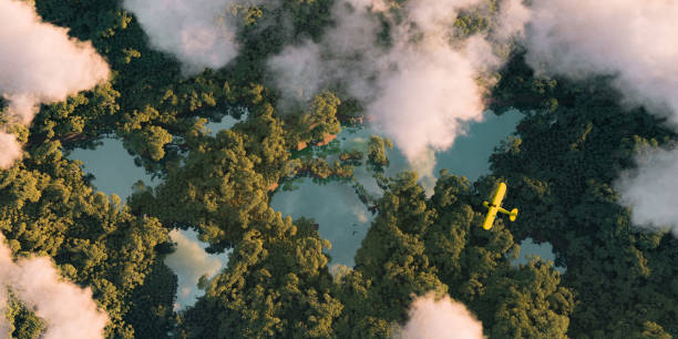 지속 가능한 서식지 세계 개념. 세계 대륙, 구름과 하나의 작은 노란색 비행기의 모양으로 호수와 조밀 한 열대 우림 식물의 먼 공중 보기. 3d 렌더링. - ecosystem environment water nature 뉴스 사진 이미지