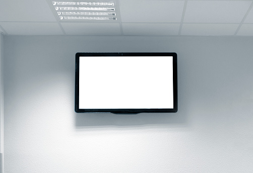 big tv screen in waiting room on wall with copy space and clipping path