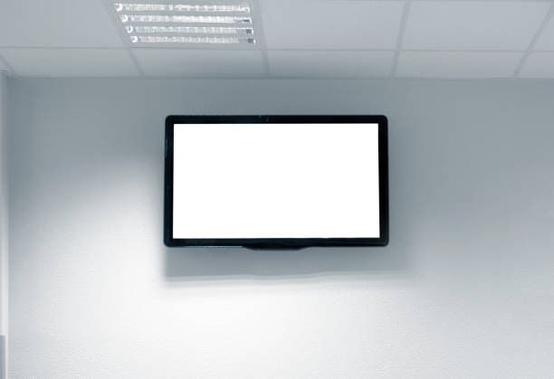 Blank white tv screen on the wall big tv screen in waiting room on wall with copy space and clipping path waiting room stock pictures, royalty-free photos & images