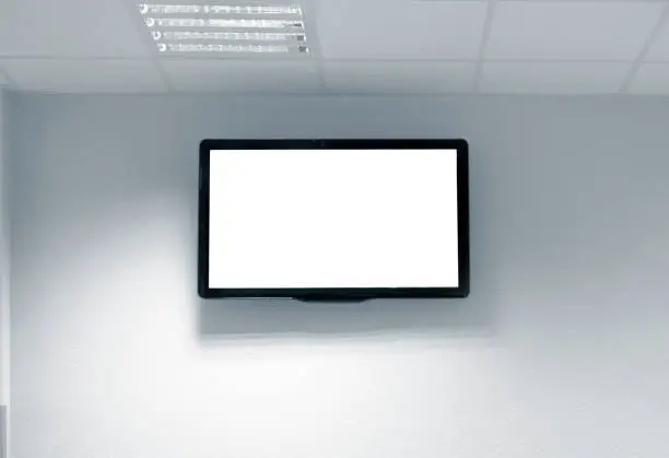 Photo of Blank white tv screen on the wall