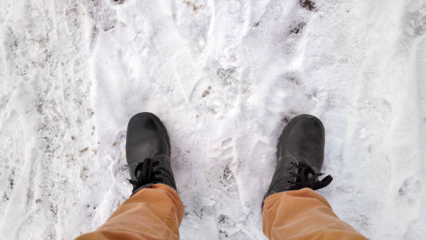 istock Feet in the snow. 1182432965