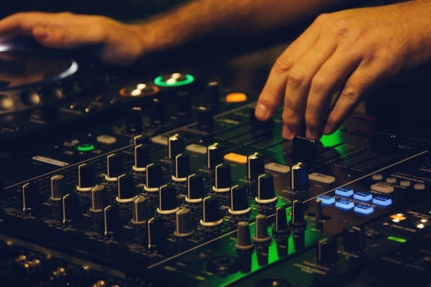 istock DJ playing music at mixer closeup 1182434303