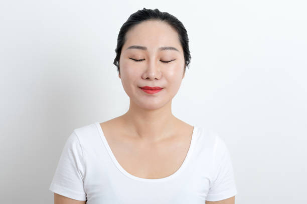 istock Chinese woman with happy smile 1182434332