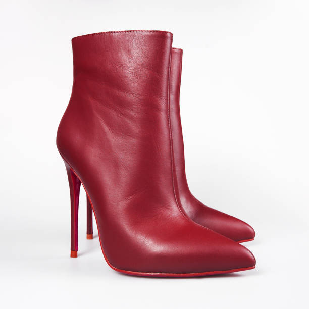 istock fashion female boots on white background 1182434607