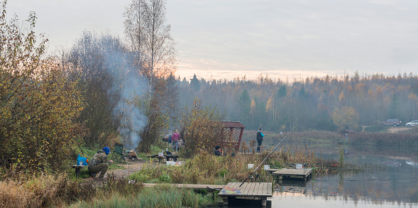 Minsk, Belarus-October 20, 2019: Fishermen on the pond catch fish.