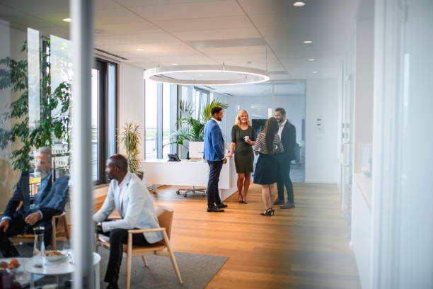 Conversation Groups on Break from Corporate Business Seminar