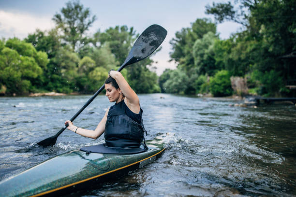 istock Woman kayaker training in river 1182436902