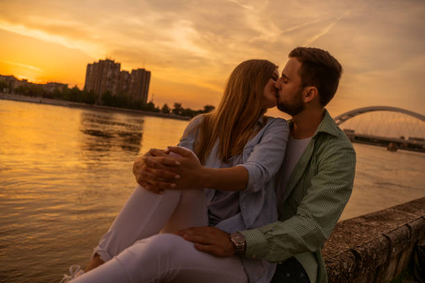 istock Young couple in sunset 1182438226