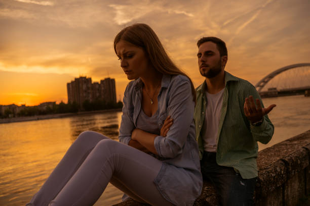 istock Young couple in sunset 1182438750