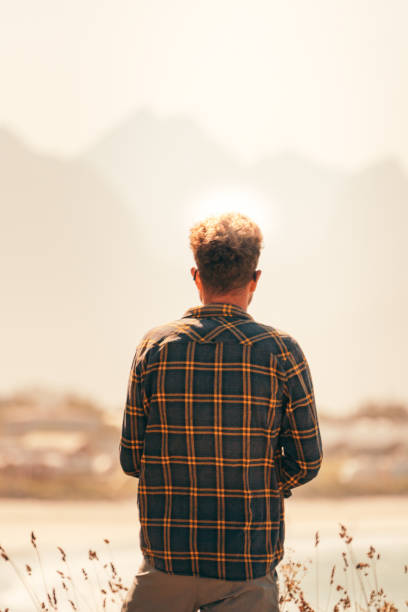 istock Man hiker looking in distance 1182439489