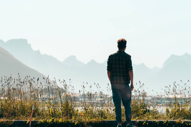 istock Man hiker looking in distance 1182439583