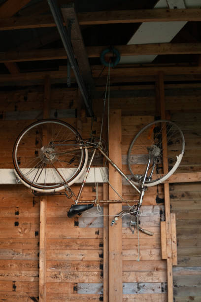 istock Bicycle on wooden wall 1182439624