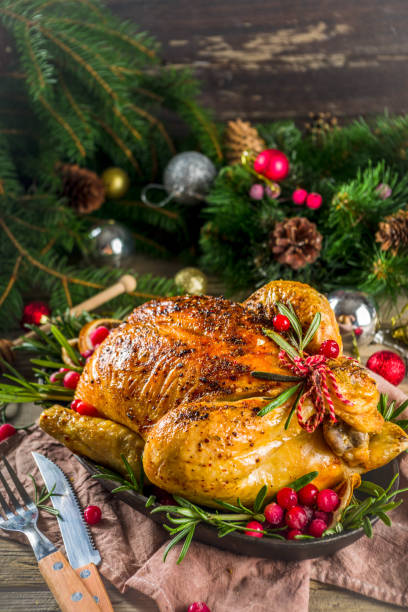 istock Roasted whole chicken with Christmas decoration 1182439789