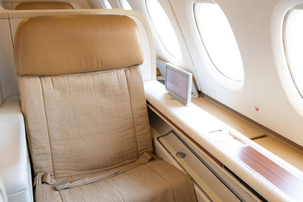 istock Business first class seat on an airline flight. 1182440390