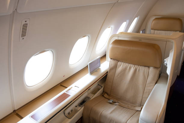 istock Business first class seat on an airline flight. 1182440403