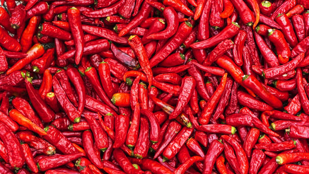 istock Close up group of red hot chilli peppers  pattern texture backgr 1182441452
