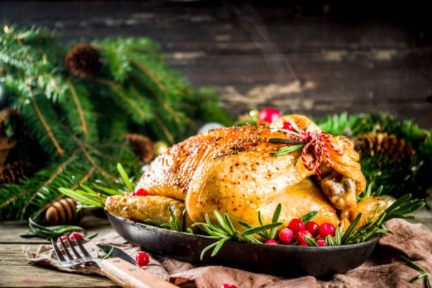 istock Roasted whole chicken with Christmas decoration 1182441709