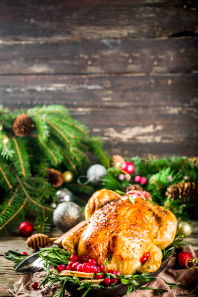 istock Roasted whole chicken with Christmas decoration 1182442011