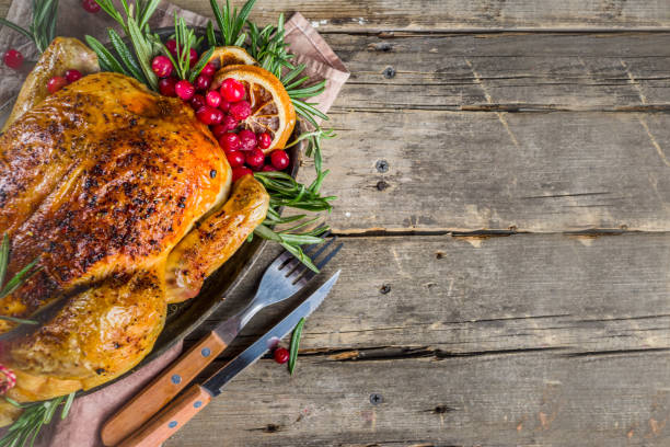 istock Roasted whole chicken with Christmas decoration 1182442274