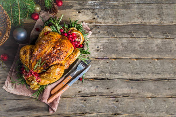 istock Roasted whole chicken with Christmas decoration 1182442276