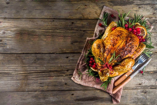 istock Roasted whole chicken with Christmas decoration 1182445705