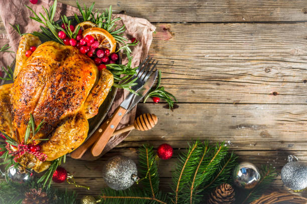 istock Roasted whole chicken with Christmas decoration 1182445806