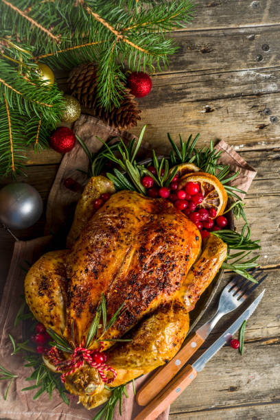istock Roasted whole chicken with Christmas decoration 1182445812