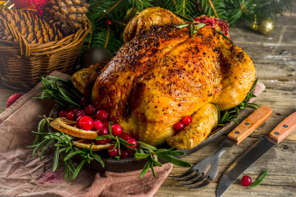 istock Roasted whole chicken with Christmas decoration 1182445881
