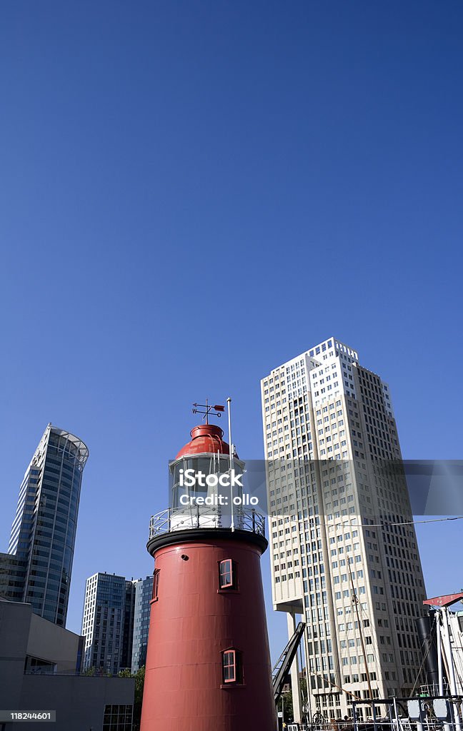 Old versus new - lighthouse and skyscrapers  Architecture Stock Photo