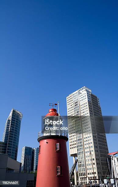 Old Versus New Lighthouse And Skyscrapers Stock Photo - Download Image Now - Architecture, Blue, Building Exterior