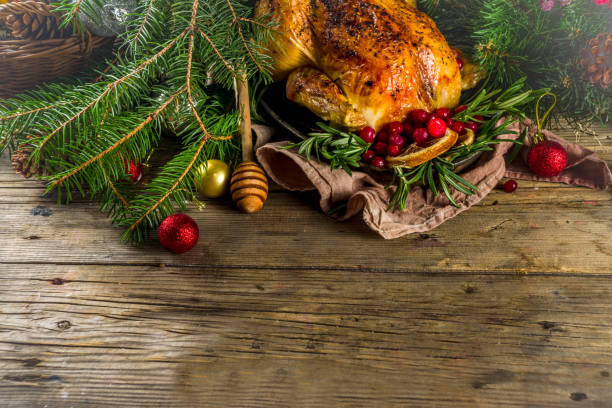 istock Roasted whole chicken with Christmas decoration 1182446412
