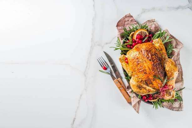 istock Roasted whole chicken with Christmas decoration 1182447324