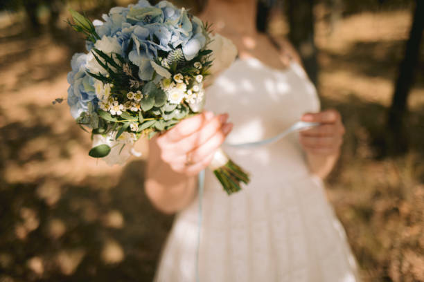 istock wedding bouquet in bride's hands 1182447477