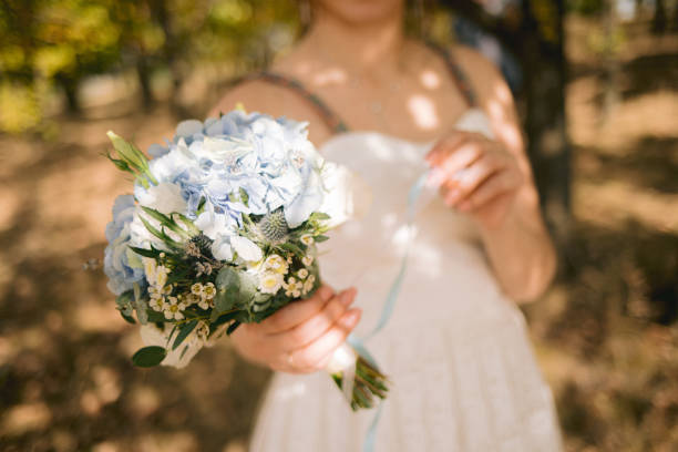 istock wedding bouquet in bride's hands 1182447518
