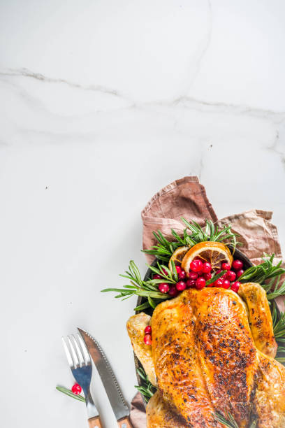 istock Roasted whole chicken with Christmas decoration 1182447528