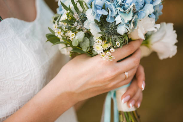 istock wedding bouquet in bride's hands 1182447567
