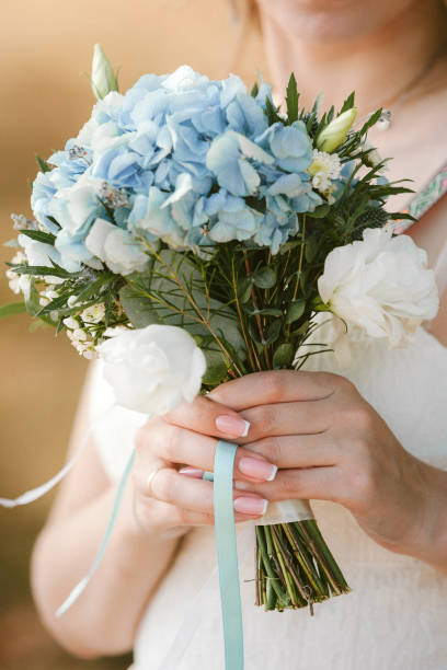istock wedding bouquet in bride's hands 1182447582