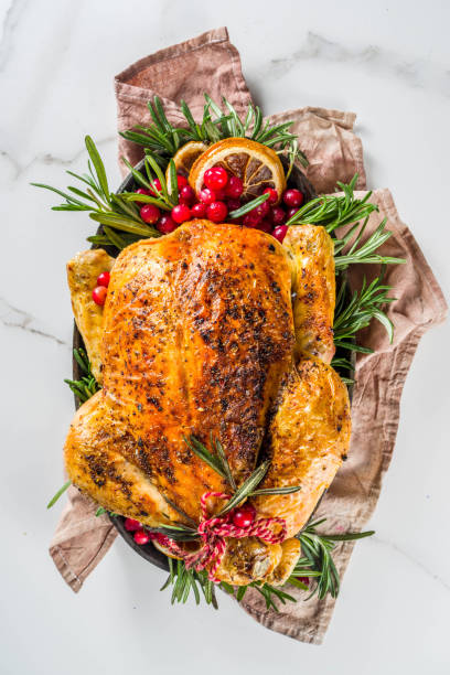 istock Roasted whole chicken with Christmas decoration 1182447610
