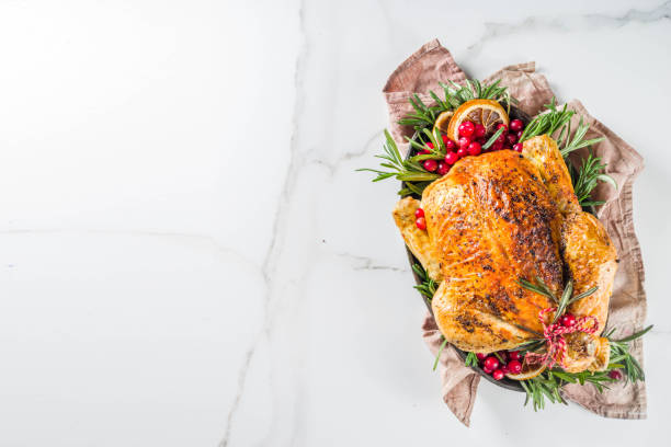 istock Roasted whole chicken with Christmas decoration 1182447702