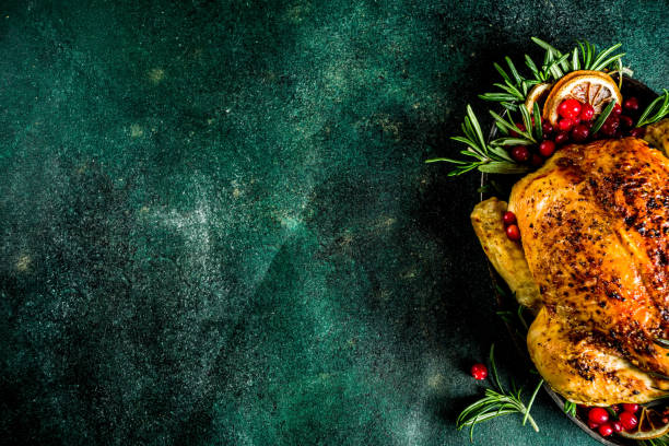 istock Roasted whole chicken with Christmas decoration 1182447746